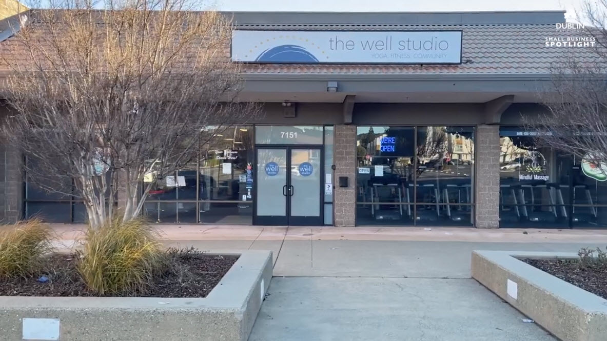 Front view of the Well Studio entrance doors as seen from the parking lot.