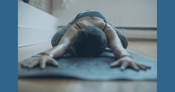 woman doing yoga and stretching to find her peace