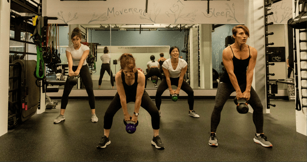 Small Group strength training with kettle bells at The Well Studio in Dublin, CA